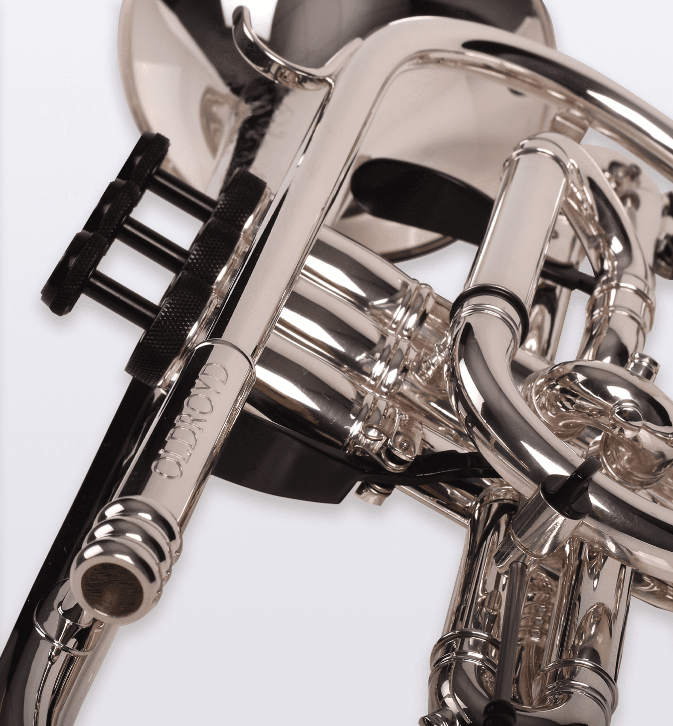Close-up of the silver finish, valves and tubing of an Oldroyd cornet